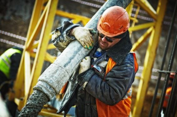 construction-worker-lifting-heavy-object